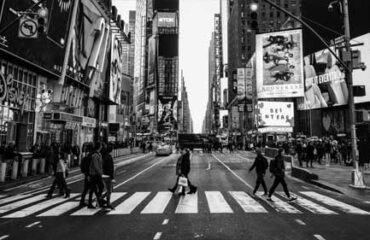 A busy, bustling crosswalk in New York