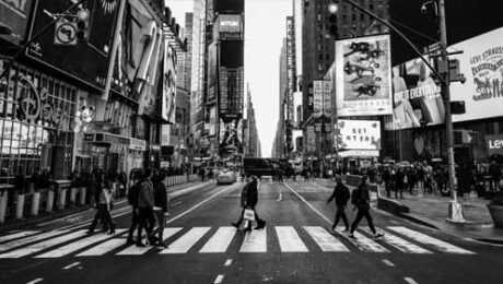 A busy, bustling crosswalk in New York